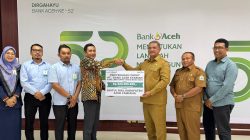 Bank Aceh Cabang Kuala Simpang Serahkan Zakat Perusahaan Rp 500 Juta ke Pemkab Aceh Tamiang.