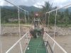 TNI AD Rampungkan Pembangunan Jembatan Gantung di Agara.