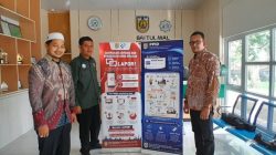 Diskominfotik Banda Aceh Distribusikan 58 Roll Banner SP4N-LAPOR dan PPID.