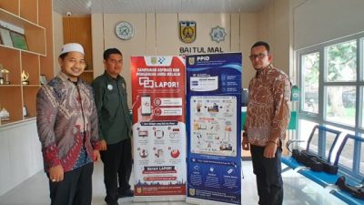 Diskominfotik Banda Aceh Distribusikan 58 Roll Banner SP4N-LAPOR dan PPID.