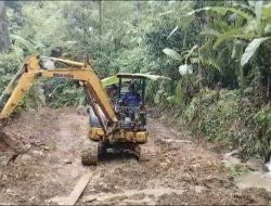 Semangat Satgas TMMD ke-129 Ditengah Cuaca Ekstrem.
