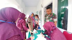 Satgas TMMD ke-129 Gandeng DP3AK Gelar Posyandu di Desa Beutong.
