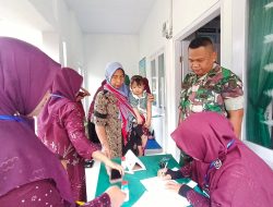 Satgas TMMD ke-129 Gandeng DP3AK Gelar Posyandu di Desa Beutong.